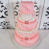 locacao de bolo cenográfico rosa e branco para festas e eventos